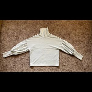 White textured turtleneck